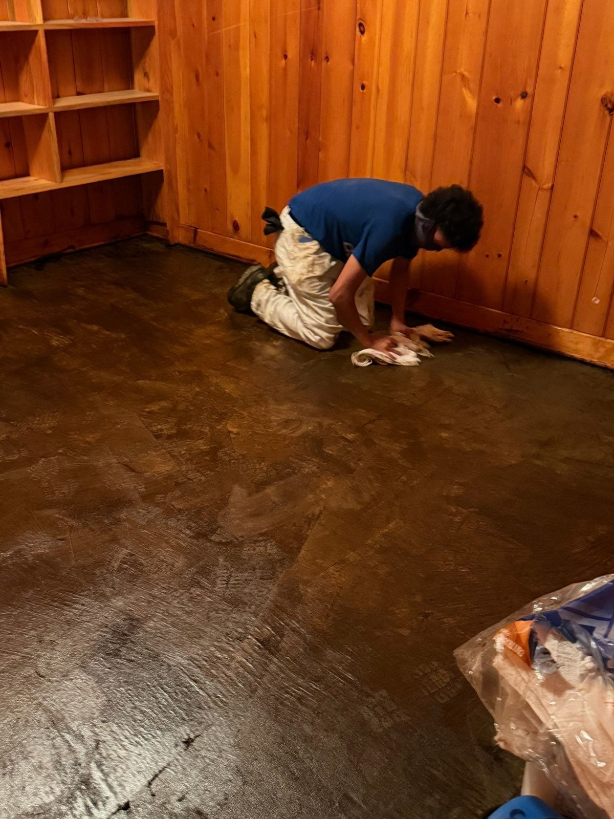 Crew member sanitizing a floor after remediation in Greensburg, PA