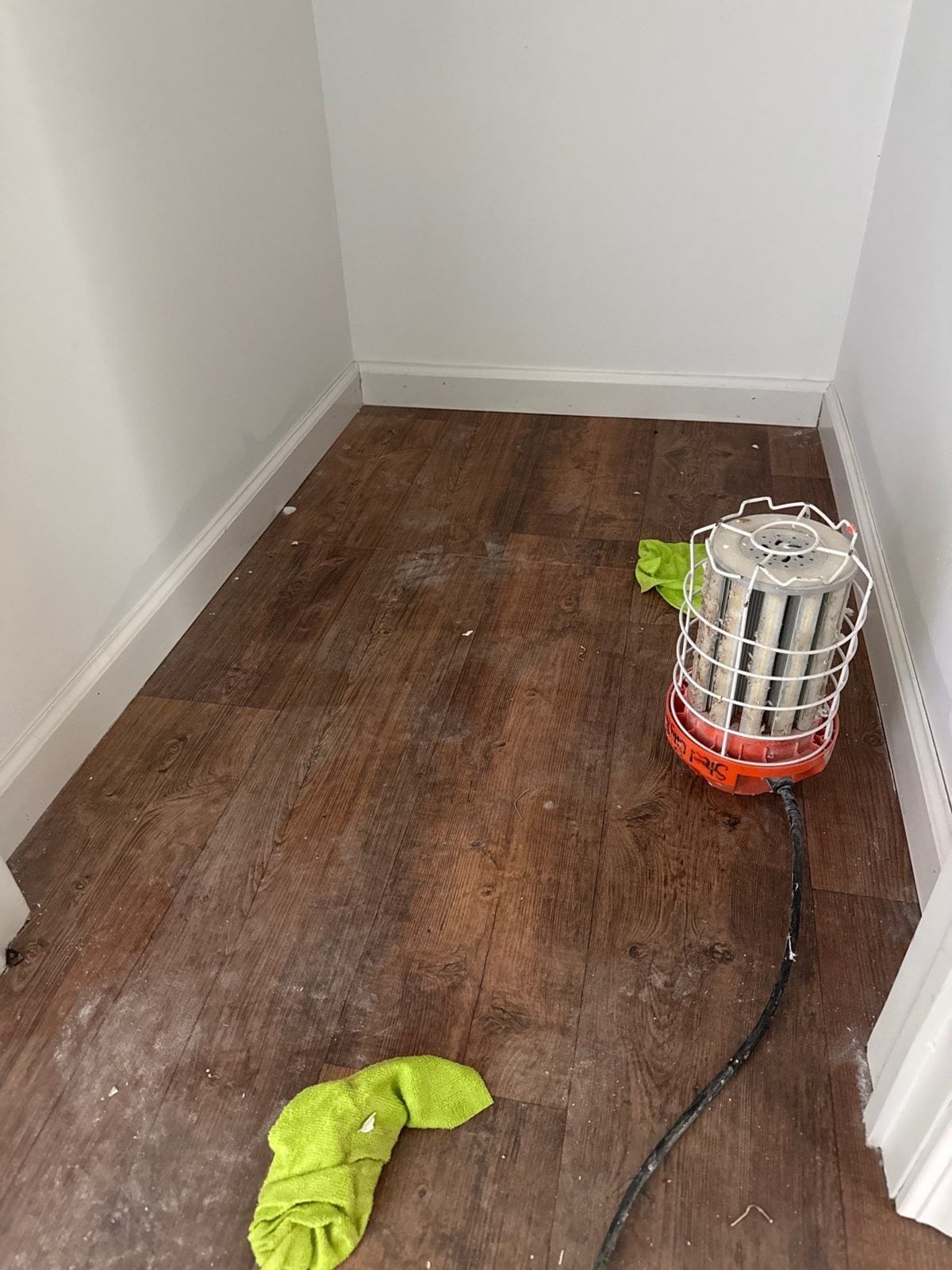 Drying equipment set up on a hardwood floor for moisture control in Leechburg, PA