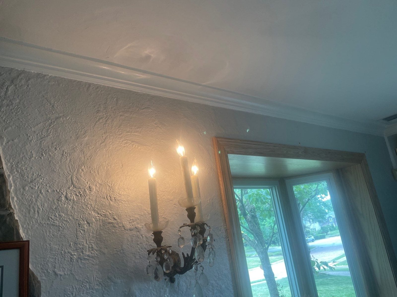 Freshly painted textured wall and crown molding in Pittsburgh, PA