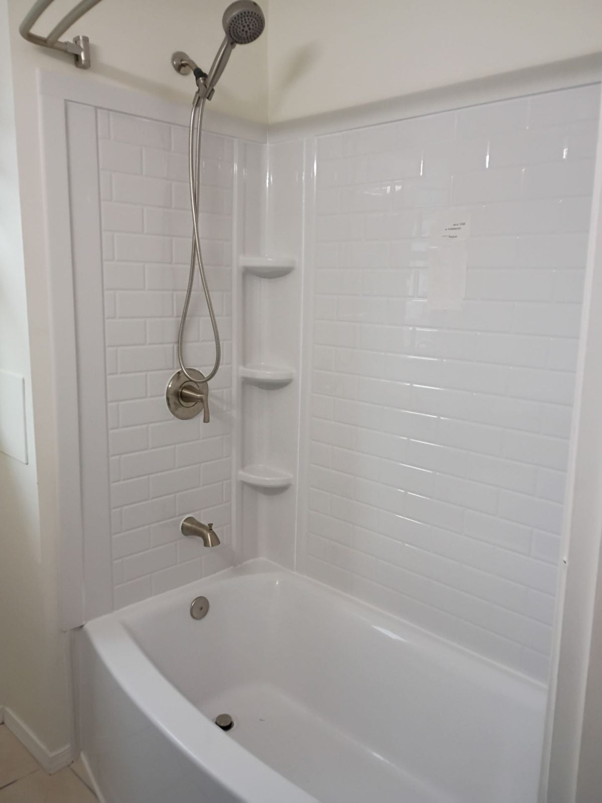 Bathroom rebuilt with a new tub and shower surround after water damage, Pittsburgh, PA