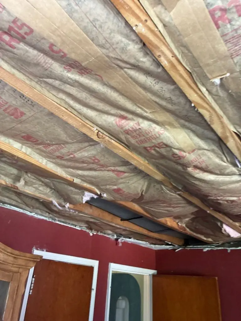 Ceiling opened to inspect hidden moisture and mold during a whole-home assessment in Pittsburgh, PA