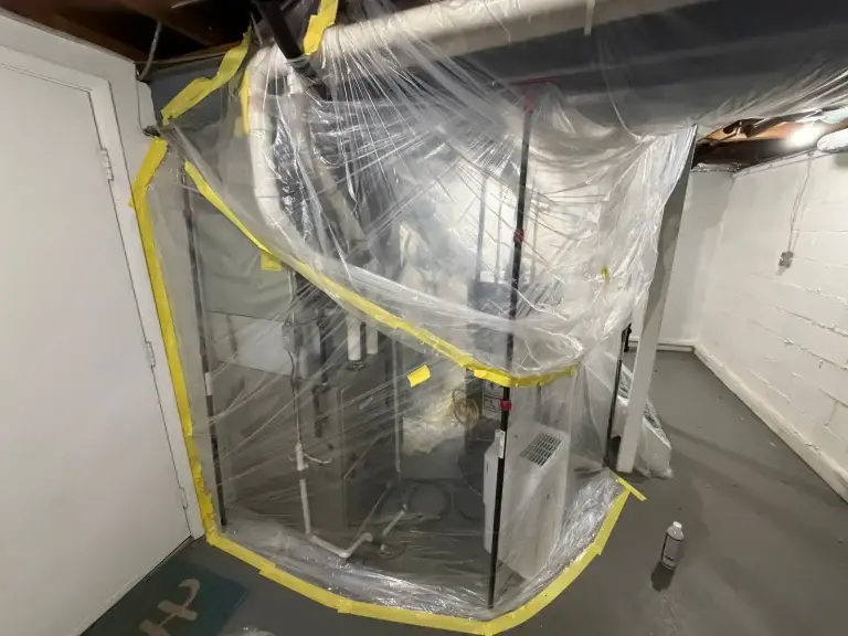 Basement stairwell sealed with containment in Baden, PA