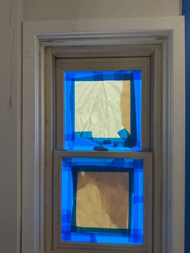 Windows masked before interior painting in Pittsburgh, PA