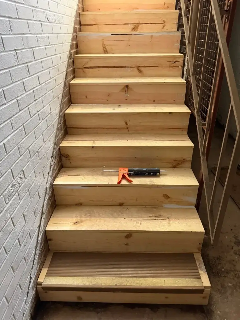 Rebuilt wooden basement stairs in Braddock, PA
