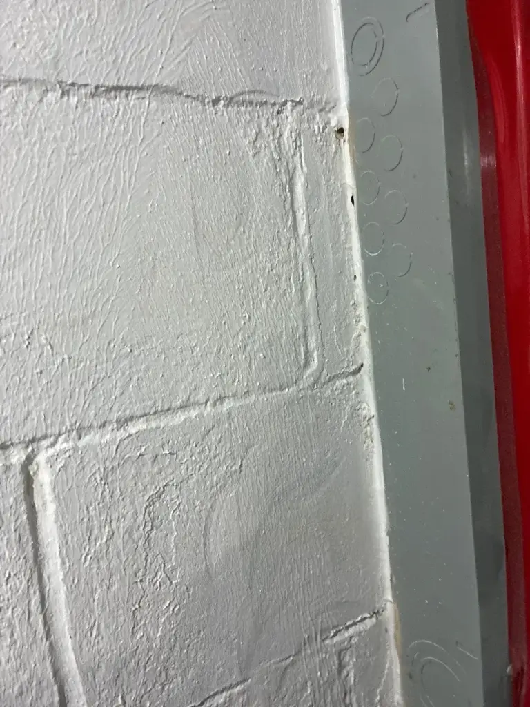 Basement wall sealed after waterproofing in Baden, PA