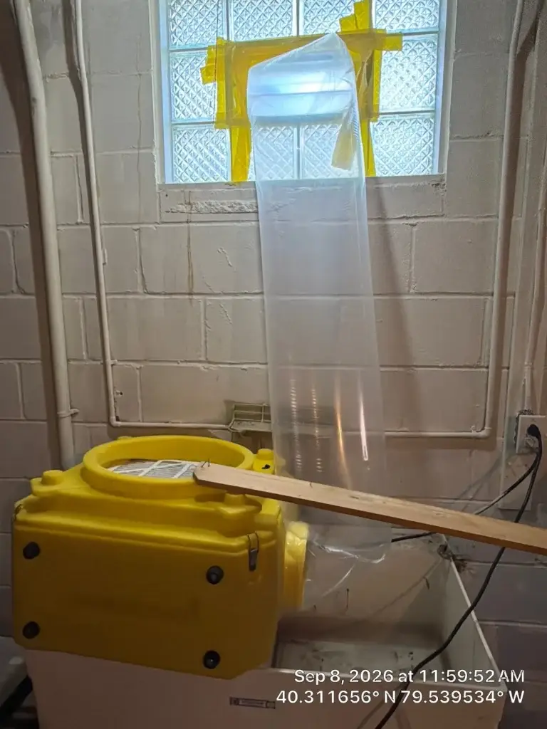 Drying equipment set up in a flooded basement in Greensburg, PA