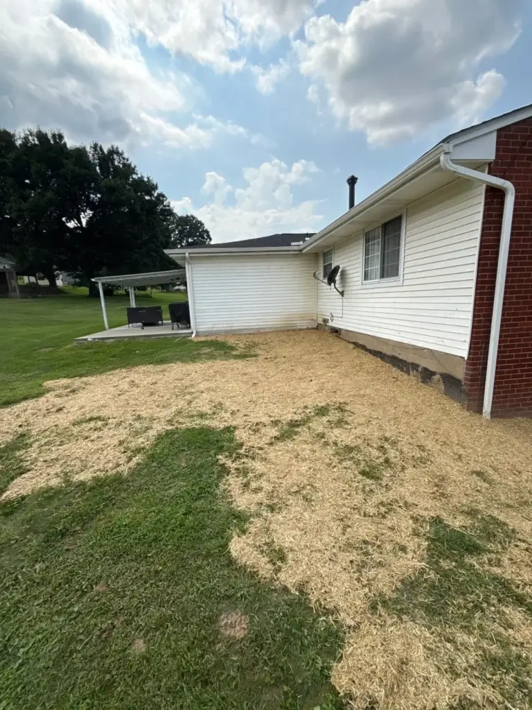 Yard regraded to slope water away from the house in Leechburg, PA