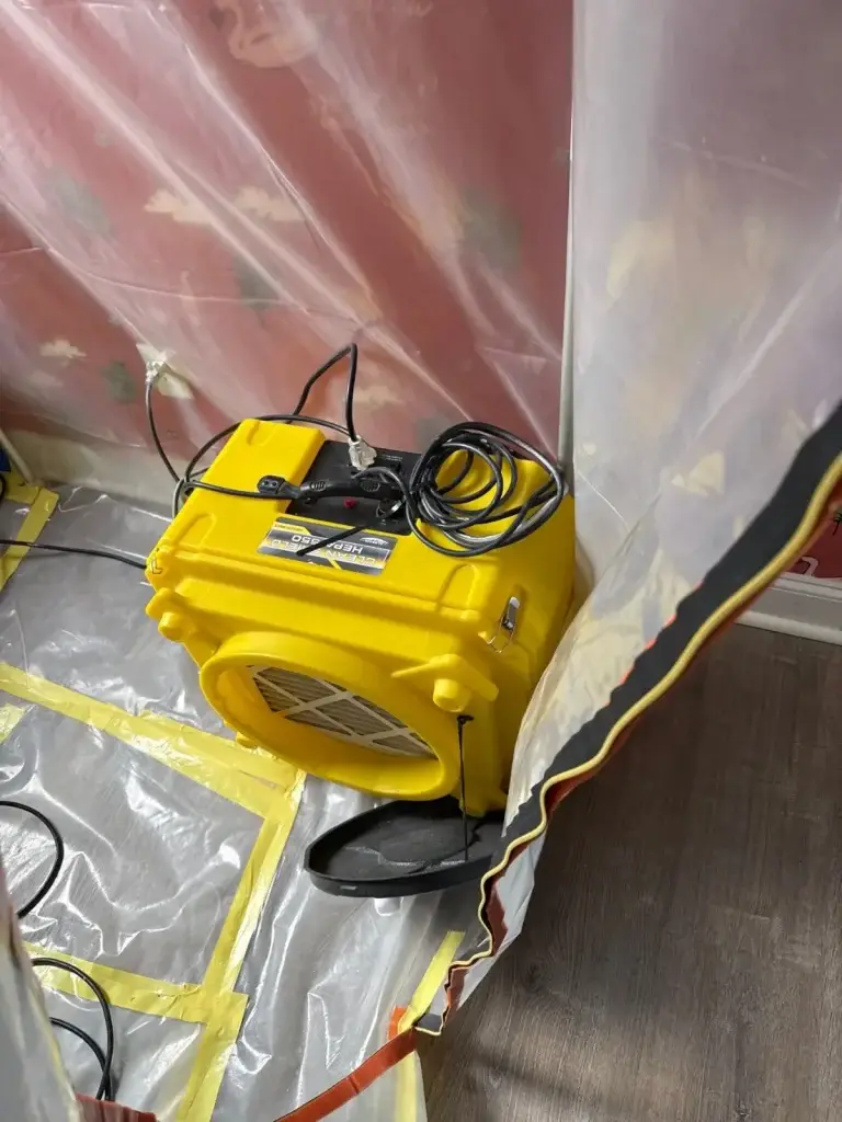 Air movers drying a water-damaged room in Pittsburgh, PA
